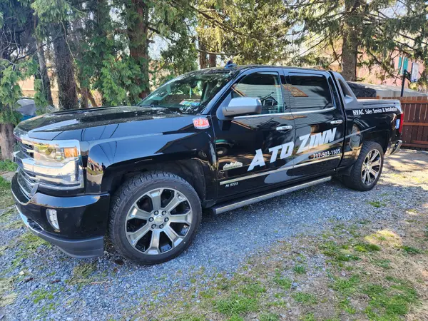 Branded A To Zinn pickup truck