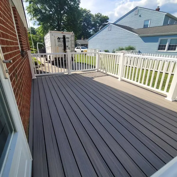 Finished composite deck with white railing
