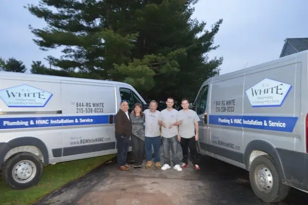R G White service vehicles and crew