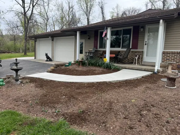 Curved concrete front walk and porch approach