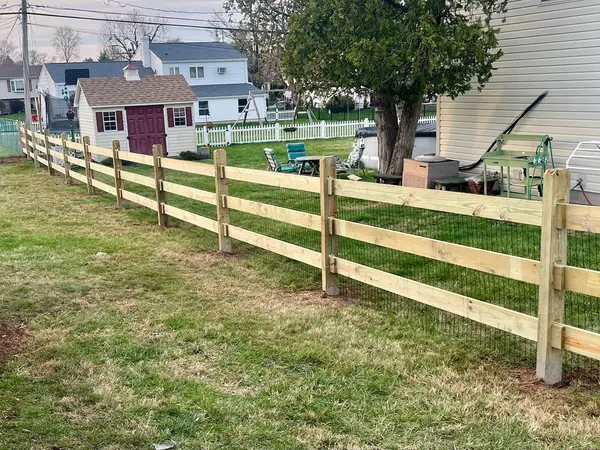Long split-rail fence installed by 215 Fence