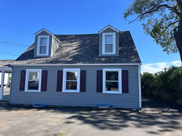 Residential house with completed roofing from Coale Roofing profile
