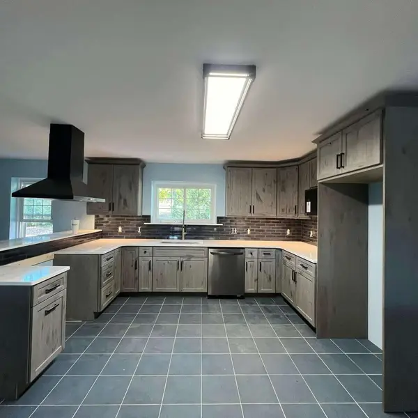 Kitchen tile flooring and cabinets