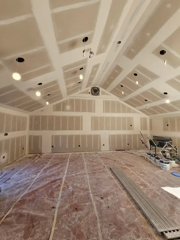 Finished high ceiling and drywall walls