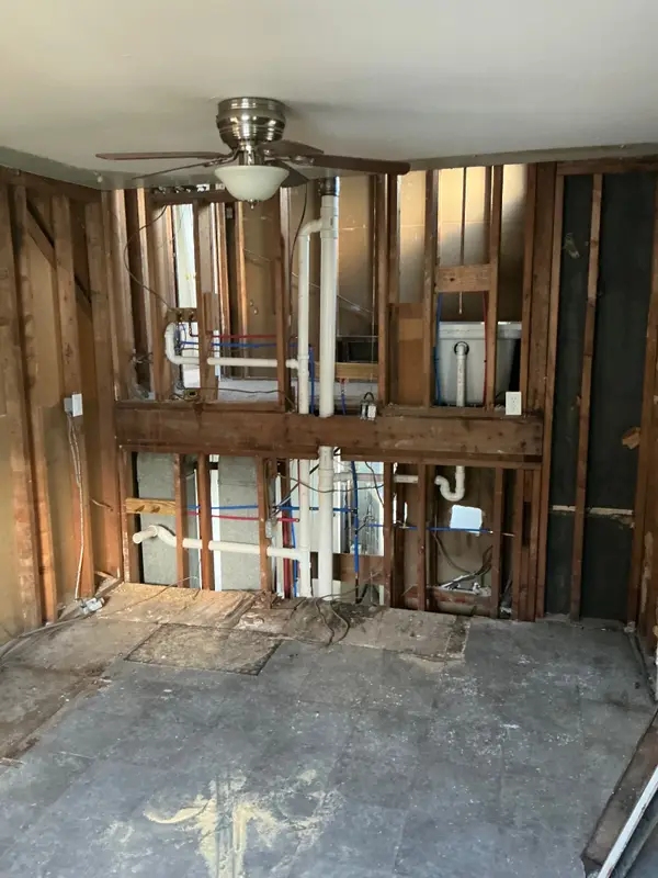 Plumbing lines installed in open framing