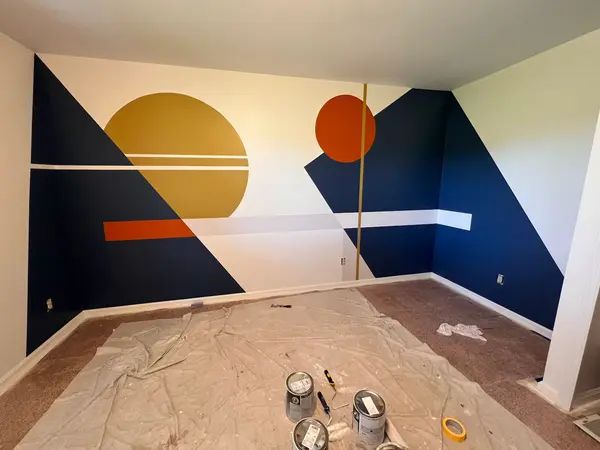 Geometric mural in a bedroom