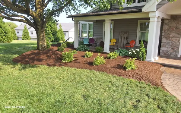Fresh mulch and front-entry landscaping