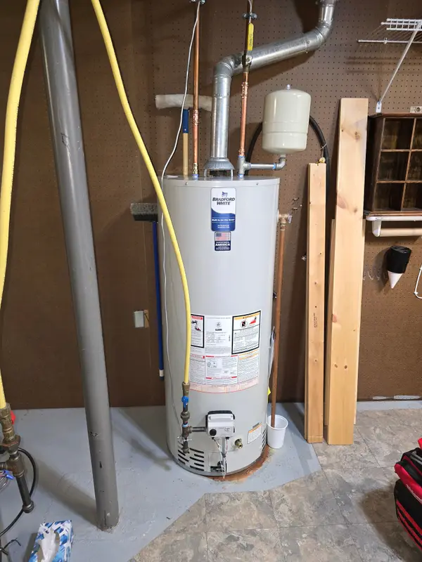 Installed water heater and piping