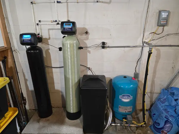 Plumbing equipment and connected pipes