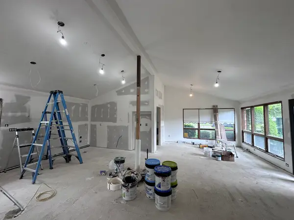 Drywall finishing in an open room
