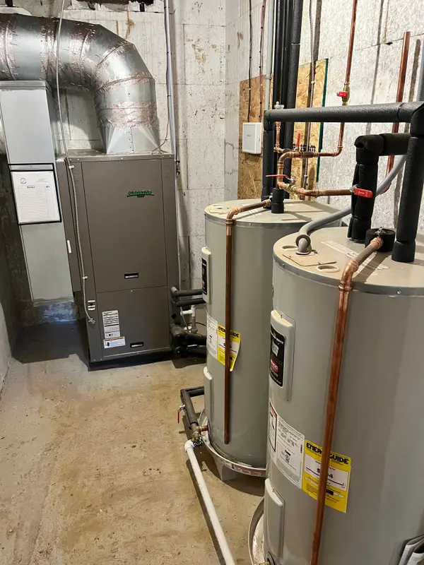 Furnace beside water-heating equipment