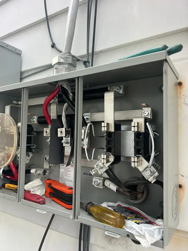 Open electrical service equipment during installation