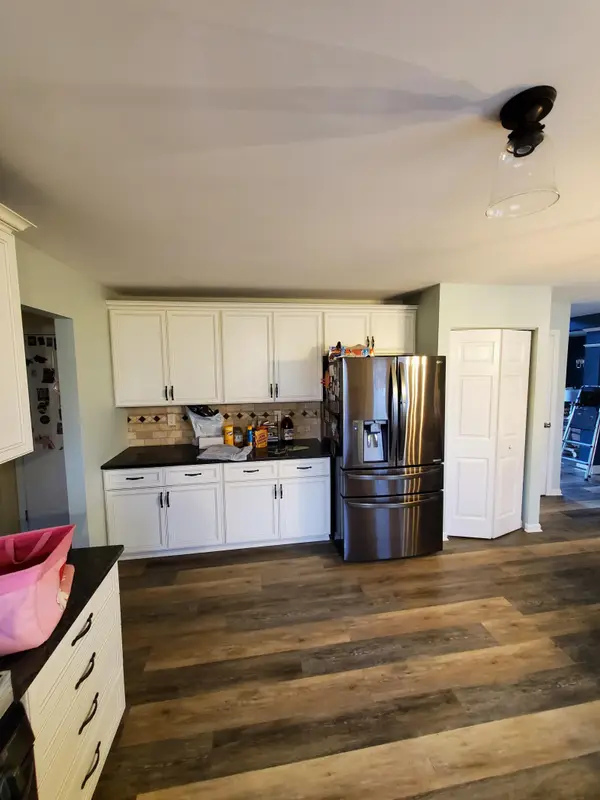 Painted interior room and kitchen area