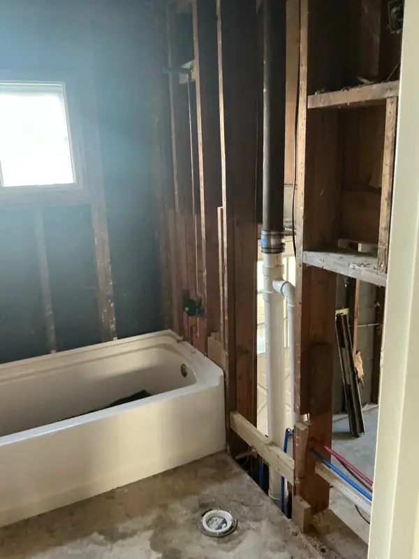 Bathroom piping before walls are closed