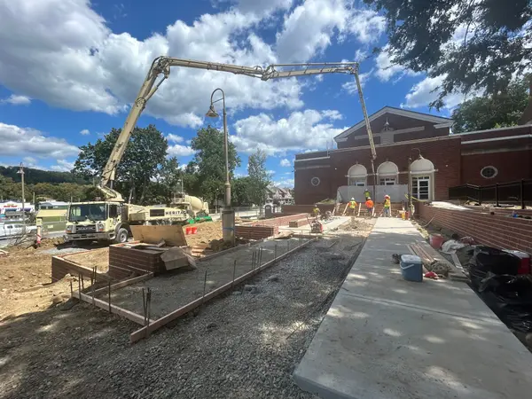 Crew placing concrete during a pour