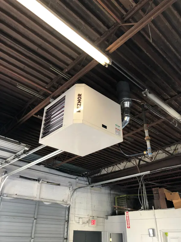 Ceiling-mounted heater in a garage
