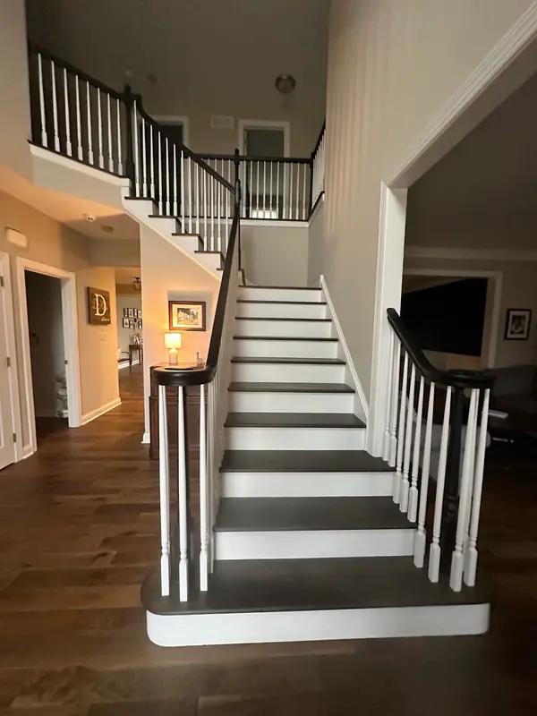 Painted stairway, railing and surrounding walls