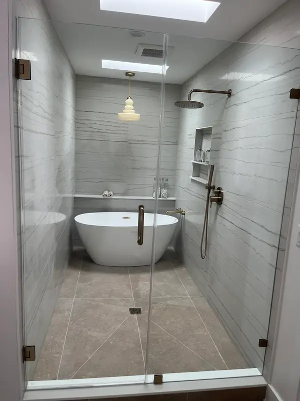Tiled shower and freestanding tub