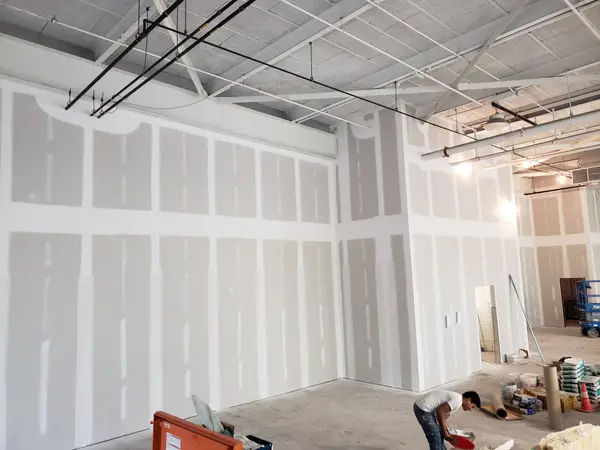 Drywall surfaces prepared in a room