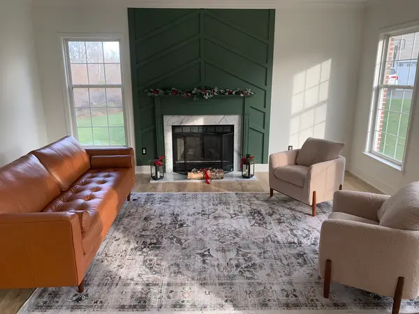 Green fireplace accent wall