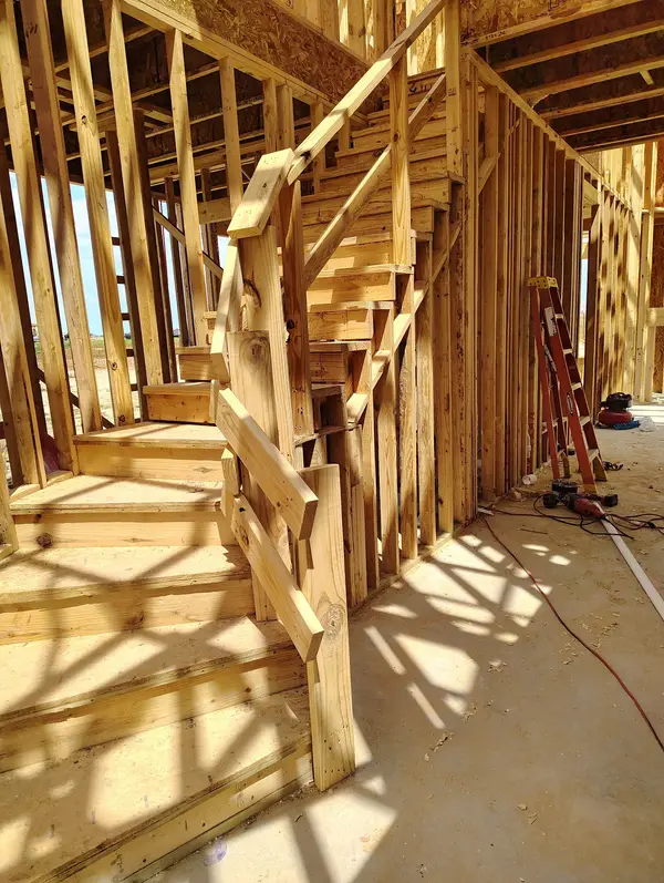 Wood stairs in an open interior