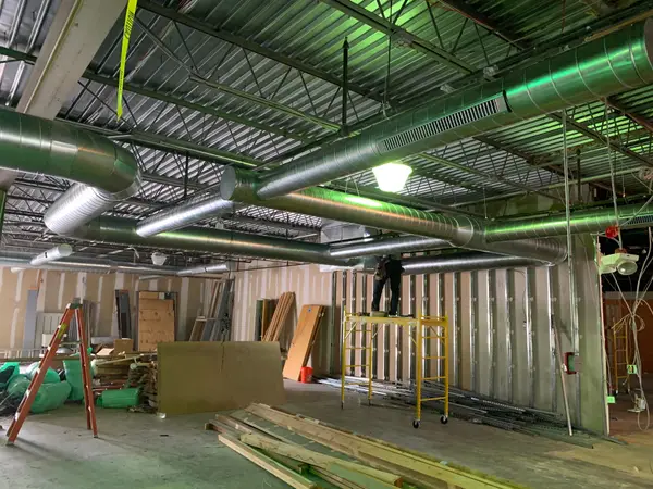 Round metal ducts installed overhead