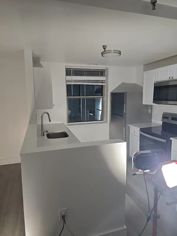 Kitchen and adjacent room
