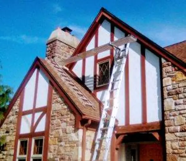 Work at an older house exterior