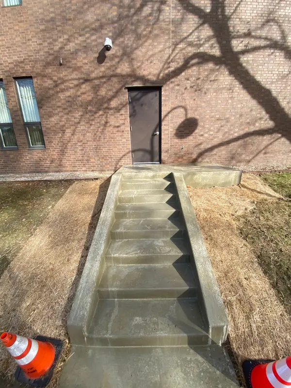 Concrete steps at a residential entrance