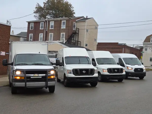 Masciantonio Plumbing and Heating service vans shown on the business profile