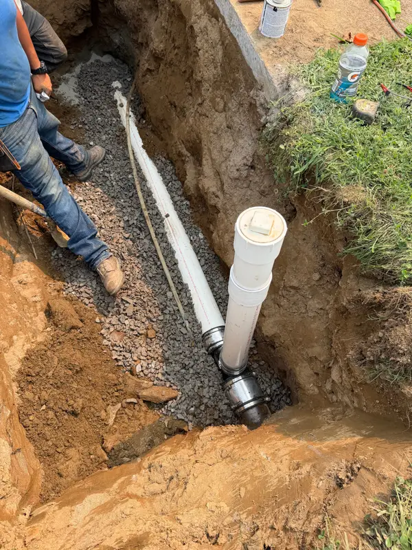 Open trench and sewer-line work shown on the Bertotti Plumbing Google Business Profile