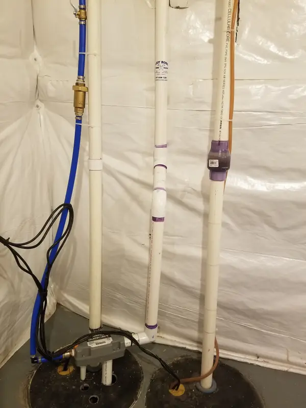 Sump and plumbing work shown on the Ray Ross Plumbing and Heating profile