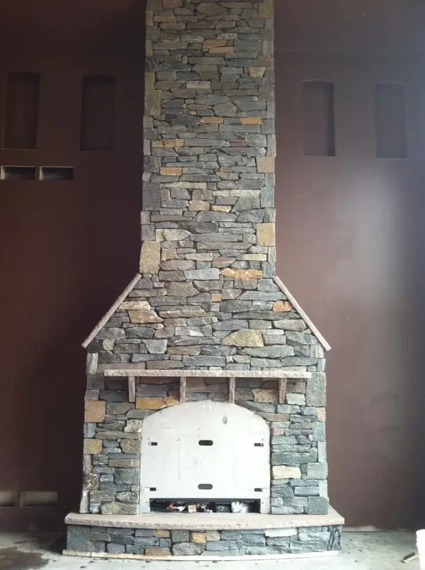 Stone interior fireplace surround