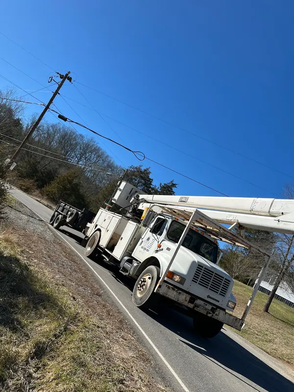 Bucket truck arriving for tree work