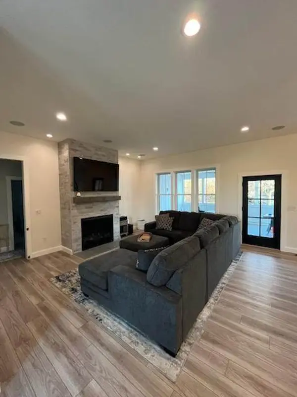 Painted living room with vaulted ceiling