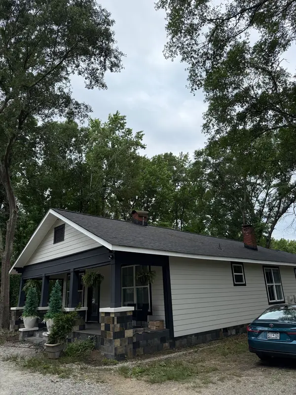 Trees surrounding a residential property