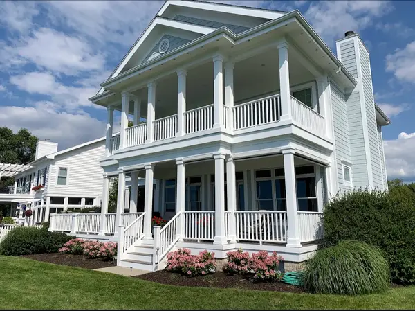 Painted two-story house and porch