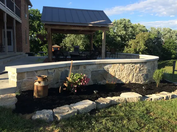 Stone wall and outdoor pavilion