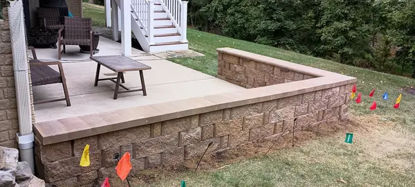 Raised patio and retaining wall