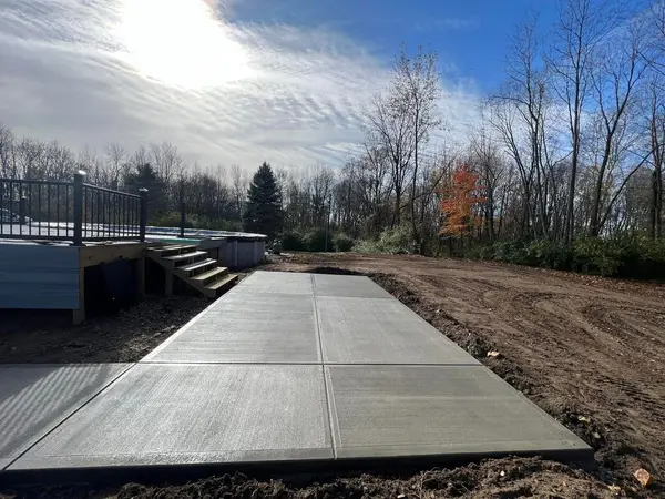 Concrete approach beside a deck