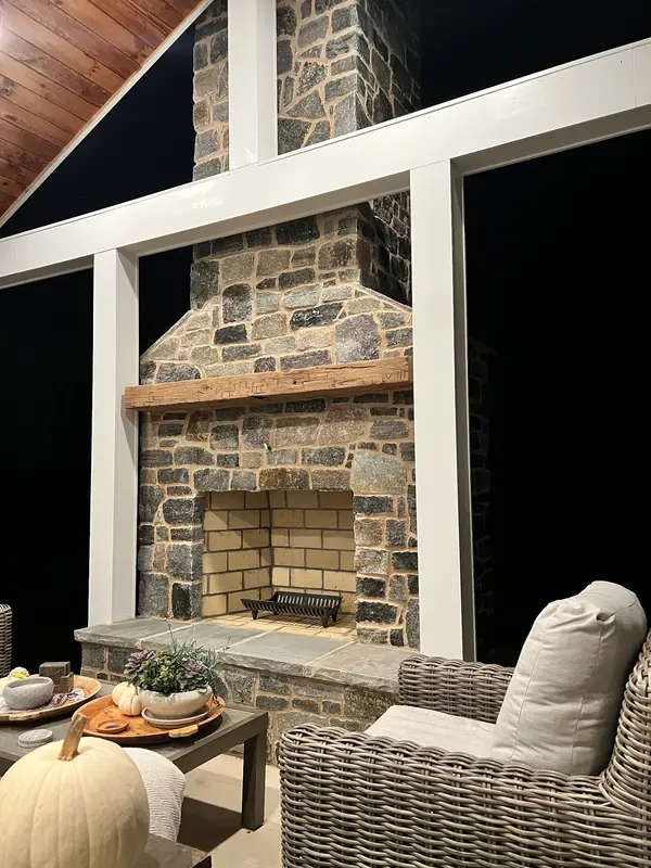 Tall stone fireplace and hearth