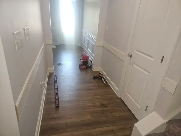 Flooring and trim in a hallway