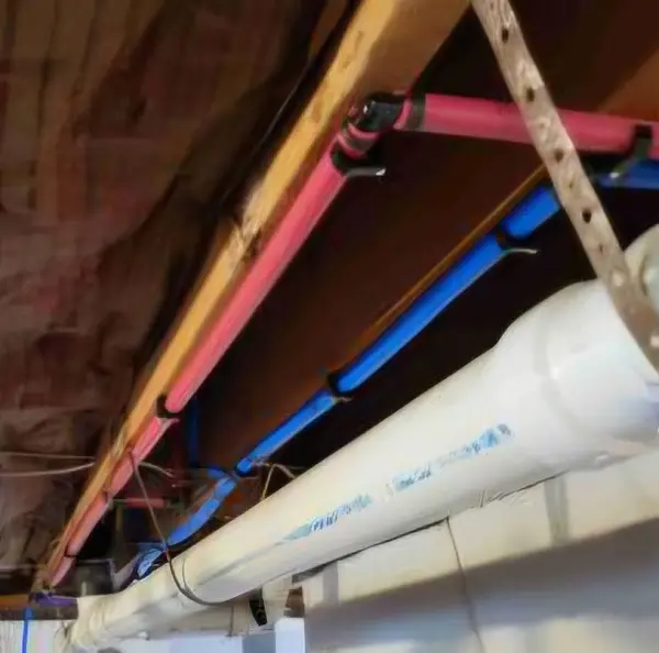 Drain and water lines under a floor