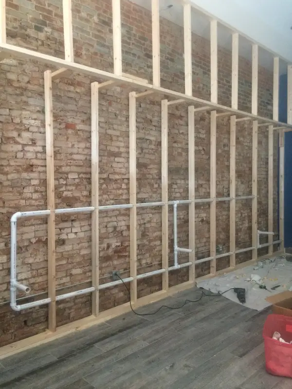 Piping through wall framing