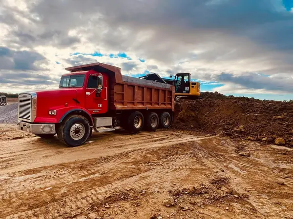 Dump truck and grading work