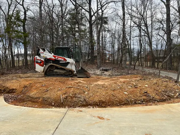 Grading equipment at a property