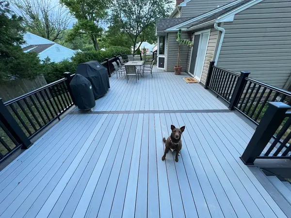 Finished residential deck with black railings