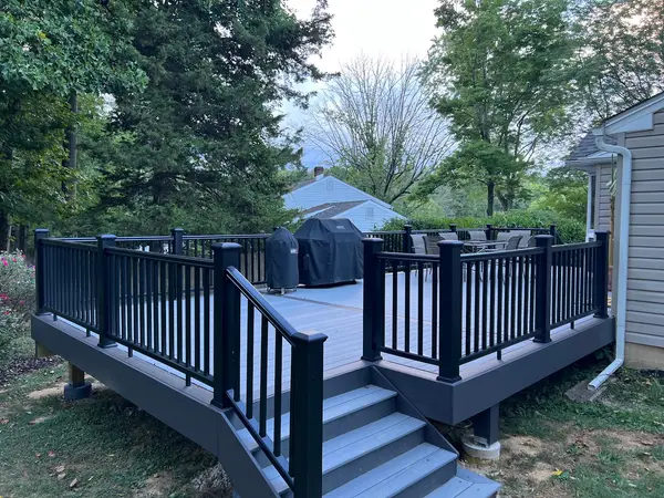 Finished residential deck by Modern Reno Associates