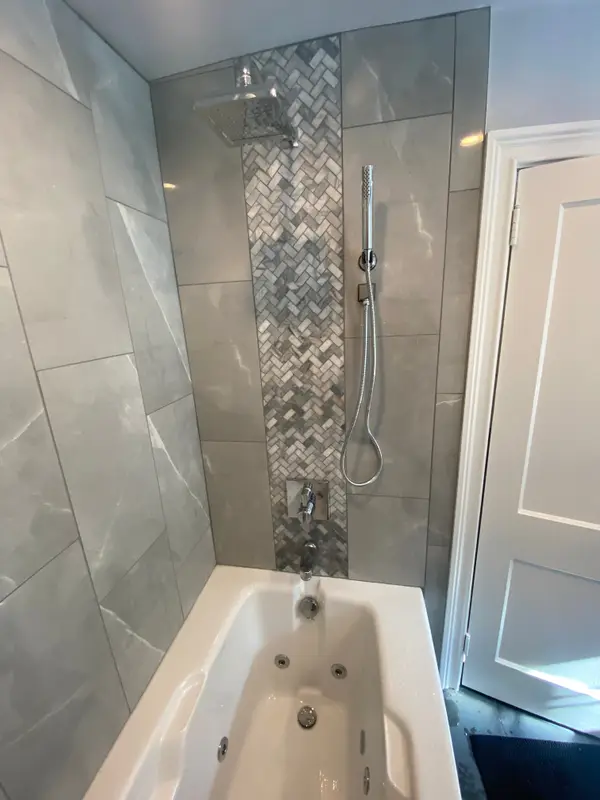 Finished tiled shower shown on the Bertotti Plumbing profile