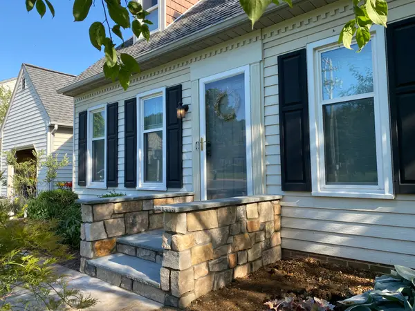 Stone-faced residential entry and steps